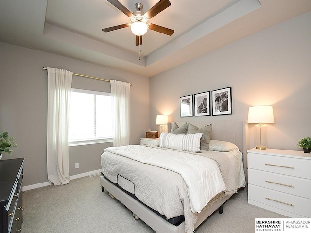7911 N 149th St, Bennington, NE 68007 - bedroom featuring ceiling fan, light carpet, baseboards, and a raised ceiling