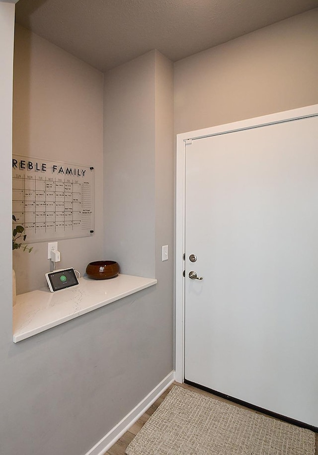7911 N 149th St, Bennington, NE 68007 - doorway to outside with baseboards