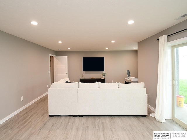 7911 N 149th St, Bennington, NE 68007 - living area featuring baseboards, recessed lighting, visible vents, and light wood-type flooring