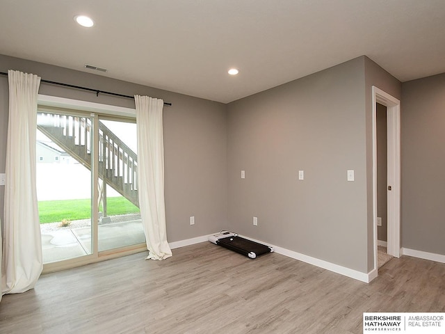 7911 N 149th St, Bennington, NE 68007 - interior space with recessed lighting, baseboards, visible vents, and light wood-style floors