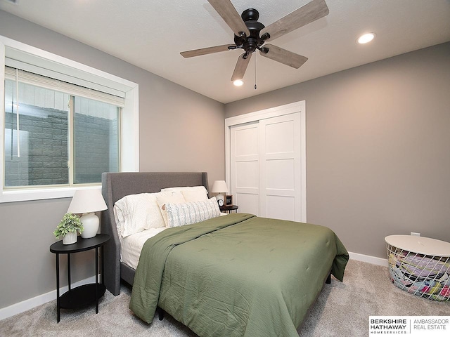7911 N 149th St, Bennington, NE 68007 - carpeted bedroom with baseboards, a closet, a ceiling fan, and recessed lighting