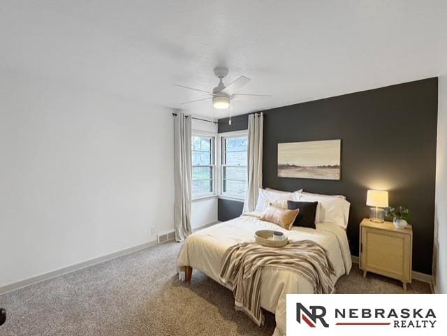 1816 S 49th St, Lincoln, NE 68506 - bedroom featuring baseboards, visible vents, ceiling fan, and carpet