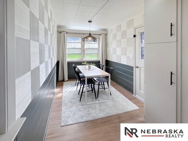 1816 S 49th St, Lincoln, NE 68506 - dining room with wood finished floors and wallpapered walls