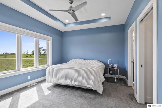 bedroom featuring baseboards, carpet, and visible vents