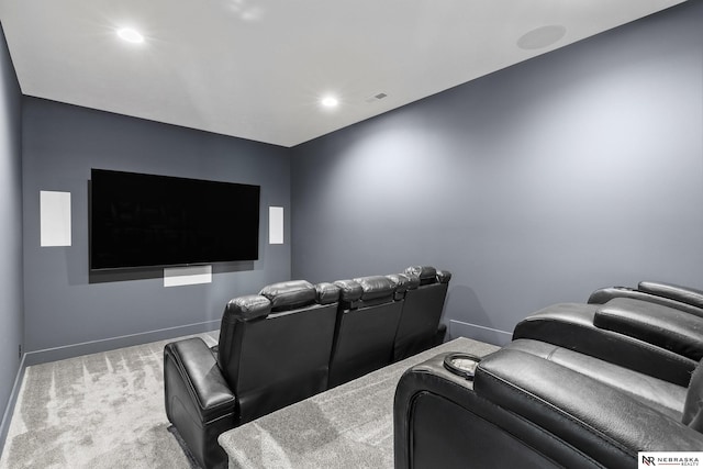 carpeted cinema with recessed lighting, baseboards, and visible vents