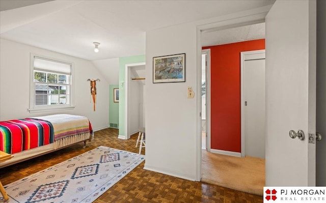 bedroom featuring baseboards
