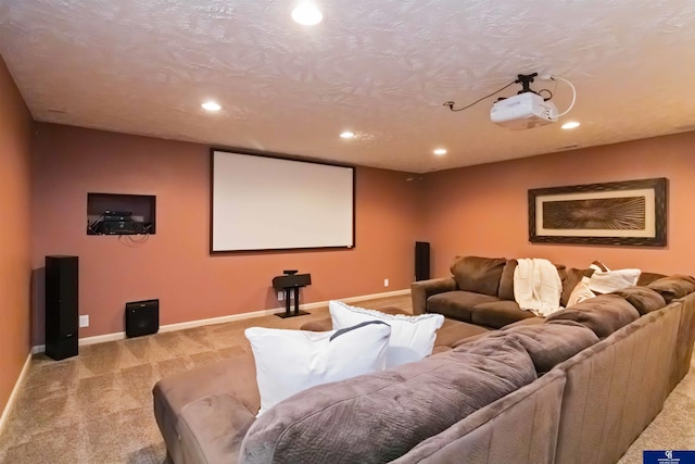 cinema room featuring light colored carpet, recessed lighting, and baseboards
