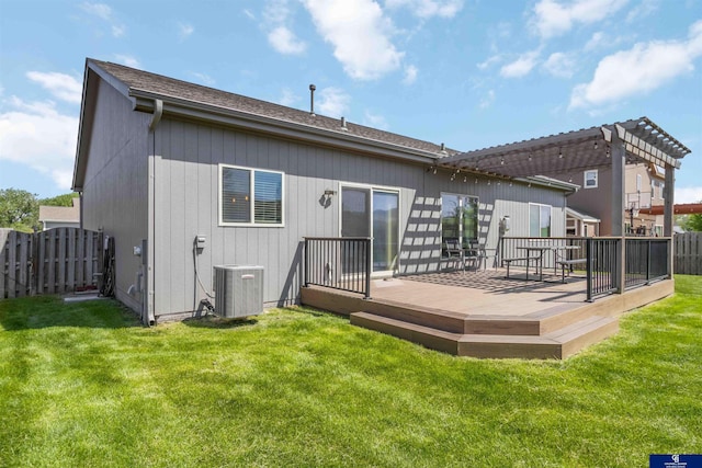 back of property featuring central AC, a deck, and a pergola