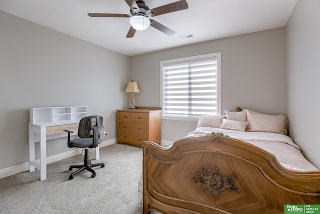 bedroom featuring carpet floors, baseboards, ceiling fan, and visible vents