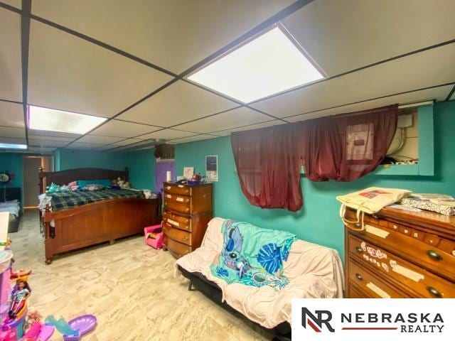 bedroom with a drop ceiling