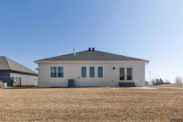 6710 S 207th Ave, Elkhorn, NE 68022 - back of house featuring a yard, central AC, and french doors