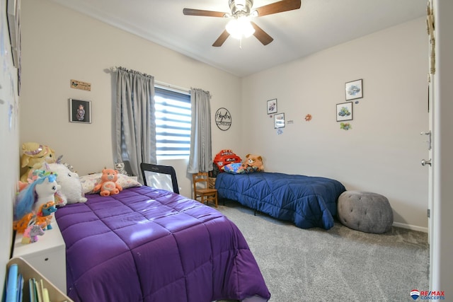 carpeted bedroom with a ceiling fan