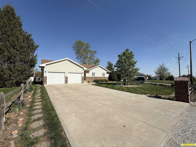 ranch-style home featuring driveway, a front yard, brick siding, fence, and an attached garage