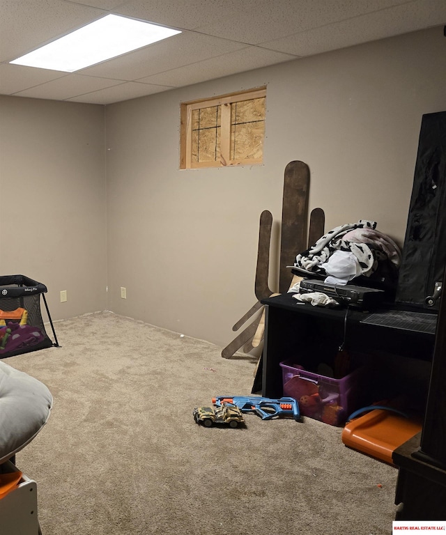 office area with carpet floors and a drop ceiling
