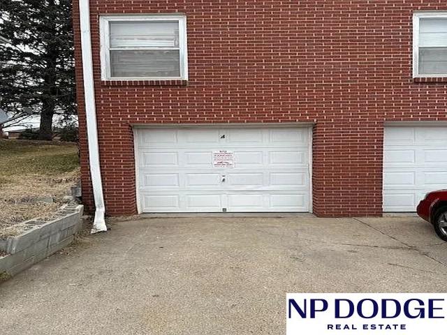 garage featuring driveway