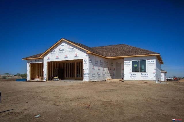 property in mid-construction featuring a garage