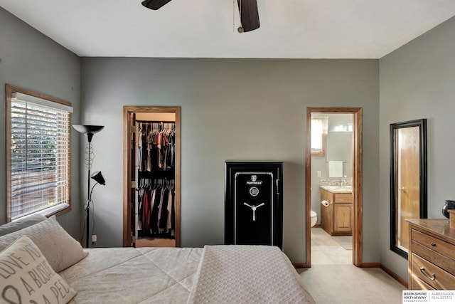 1529 E Apple Rd, Cortland, NE 68331 - bedroom featuring ensuite bathroom, a closet, ceiling fan, light carpet, and a spacious closet