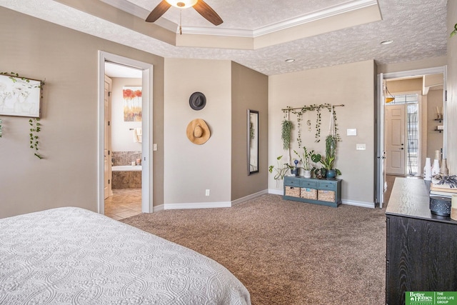 bedroom featuring light carpet, a textured ceiling, baseboards, and a raised ceiling