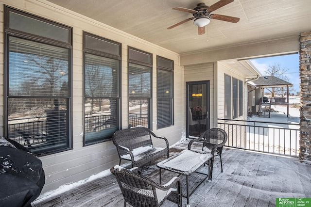 exterior space featuring ceiling fan