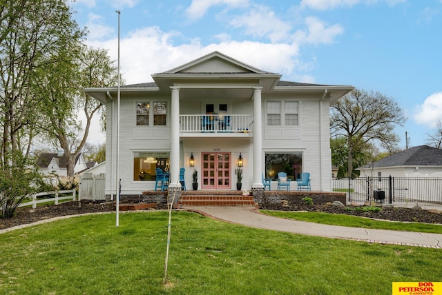 1638 N Nye Ave, Fremont, NE 68025 - back of house with a yard, fence, french doors, and a balcony