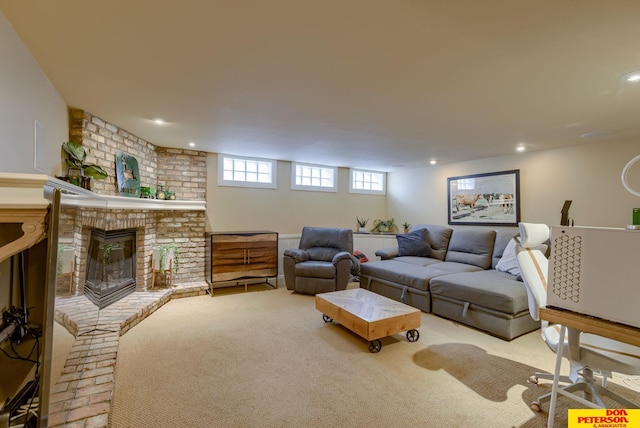 1638 N Nye Ave, Fremont, NE 68025 - carpeted living room featuring a brick fireplace and recessed lighting