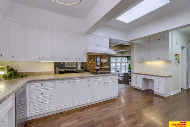 1638 N Nye Ave, Fremont, NE 68025 - kitchen featuring ornamental molding, dark wood-type flooring, black electric stovetop, built in desk, and white cabinets