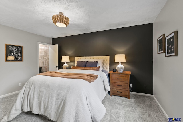carpeted bedroom with baseboards
