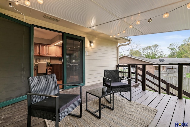 deck featuring visible vents