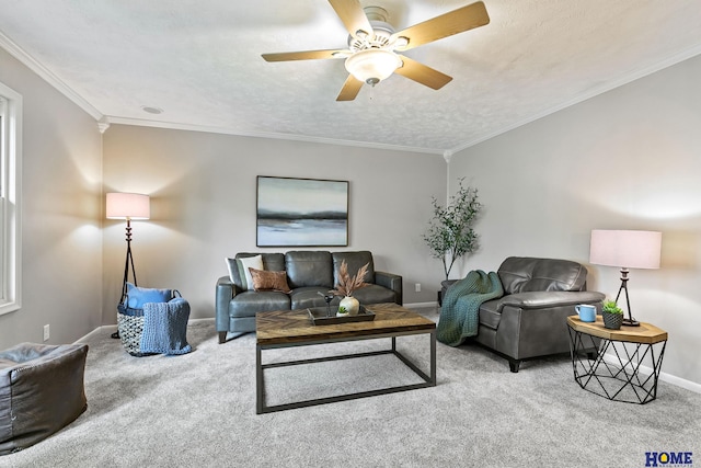 living room with ceiling fan, ornamental molding, carpet flooring, and baseboards