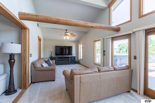 S-1129 Platte Shore Dr, Fremont, NE 68025 - living room featuring light colored carpet, ceiling fan, beam ceiling, high vaulted ceiling, and baseboards