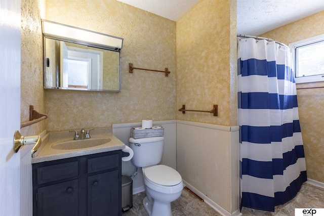 S-1129 Platte Shore Dr, Fremont, NE 68025 - full bath featuring toilet, vanity, and a shower with curtain
