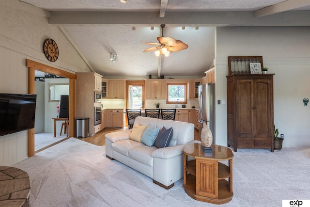 S-1129 Platte Shore Dr, Fremont, NE 68025 - living area with light colored carpet and a ceiling fan