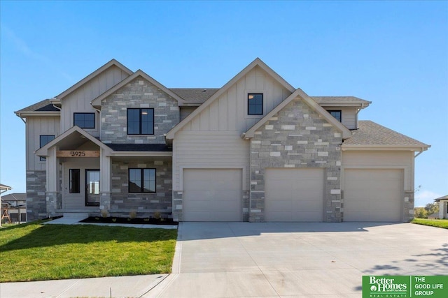 craftsman house with an attached garage, stone siding, concrete driveway, a front yard, and board and batten siding