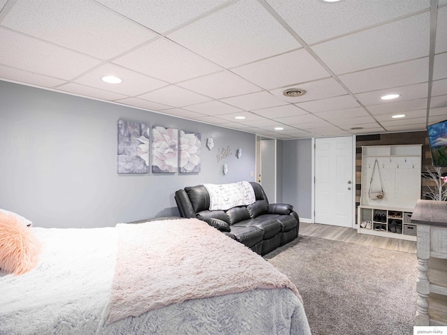 7521 Edward Ave, La Vista, NE 68128 - bedroom featuring wood finished floors, a drop ceiling, and recessed lighting