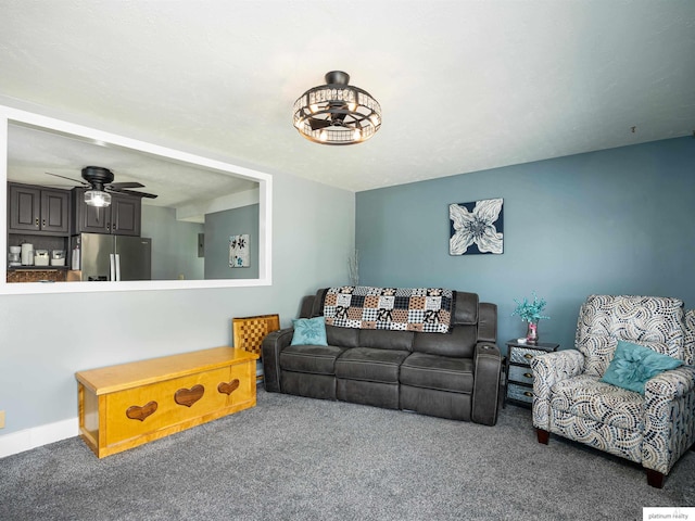 7521 Edward Ave, La Vista, NE 68128 - living area with carpet, ceiling fan, and baseboards