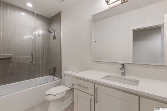 501 S 243rd St, Waterloo, NE 68069 - full bath with toilet, vanity, shower / bath combination with glass door, recessed lighting, and tile patterned flooring
