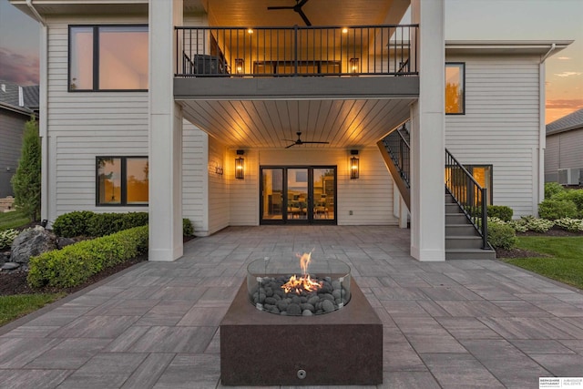 501 S 243rd St, Waterloo, NE 68069 - back of house with a balcony, a fire pit, a patio, and stairway
