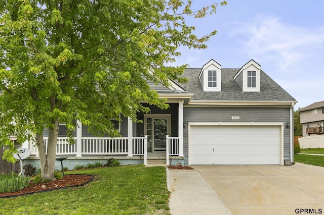 view of front facade featuring driveway, covered porch, an attached garage, a shingled roof, and a front lawn