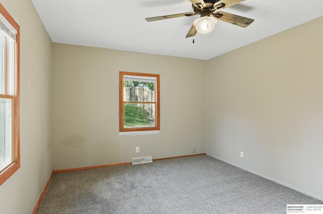 6523 Emmet St, Omaha, NE 68104 - unfurnished room featuring carpet flooring, visible vents, and baseboards