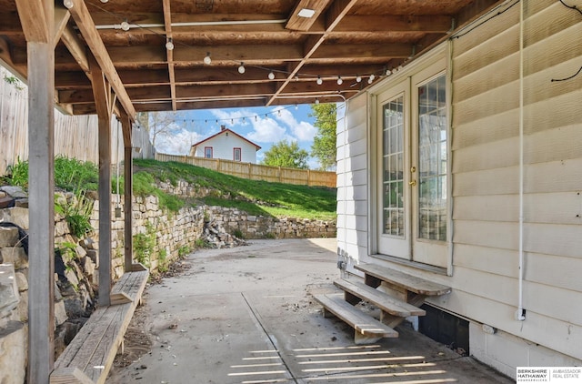 6523 Emmet St, Omaha, NE 68104 - view of patio featuring fence and entry steps
