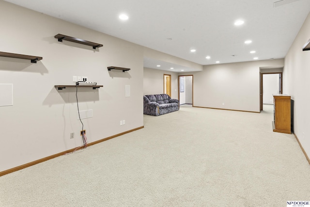 finished basement featuring carpet, baseboards, and recessed lighting