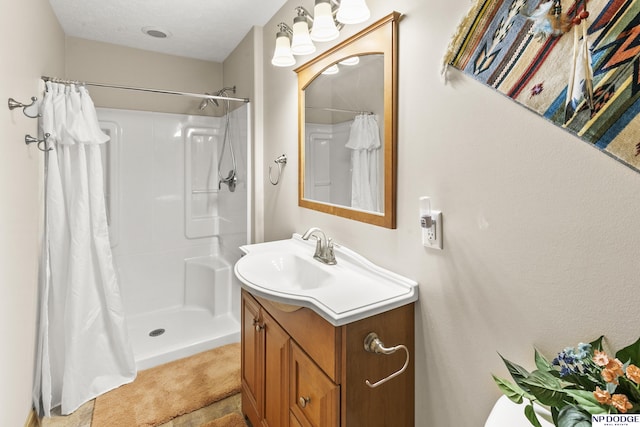 full bath with a shower with curtain and vanity