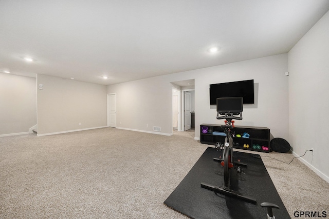 workout room featuring carpet, visible vents, and recessed lighting