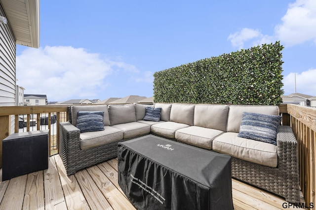 wooden deck with outdoor lounge area