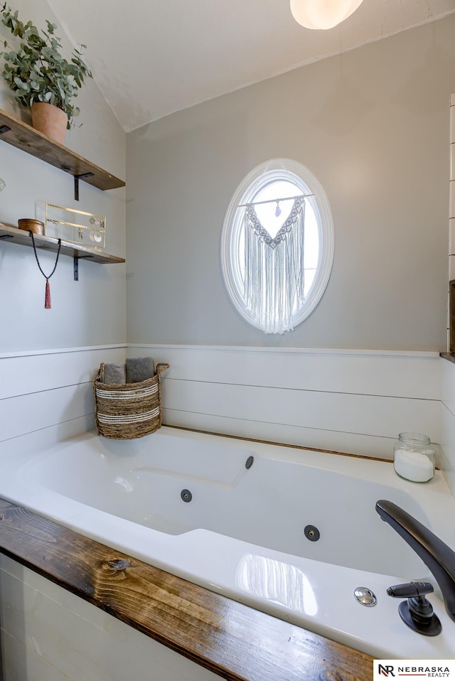 bathroom featuring a jetted tub