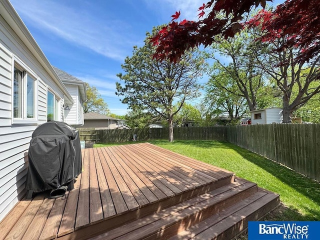 wooden deck featuring grilling area