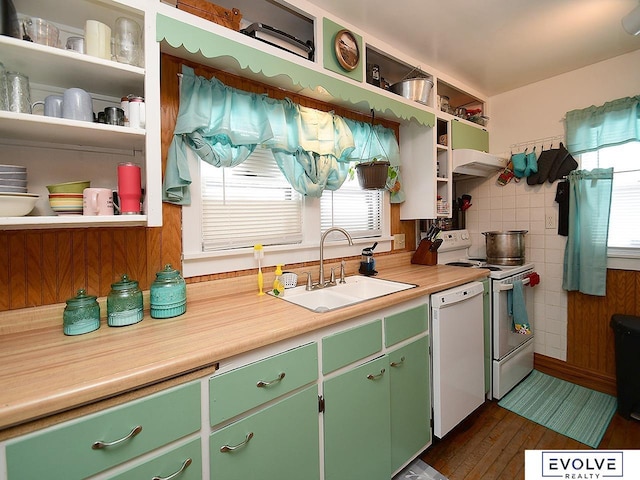 kitchen with white dishwasher, range with electric cooktop, open shelves, a sink, and healthy amount of natural light
