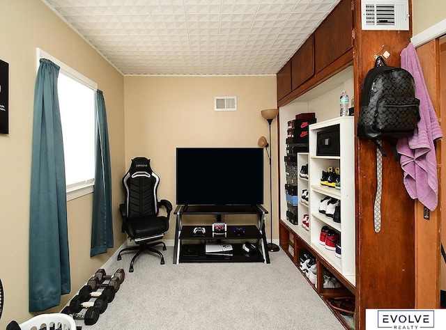 exercise room with carpet floors