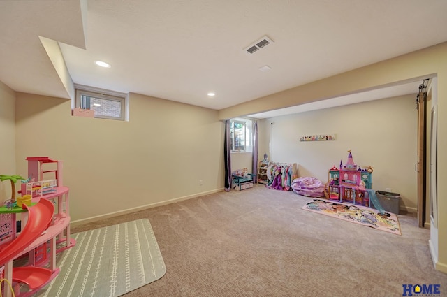 recreation room with carpet floors, recessed lighting, and baseboards