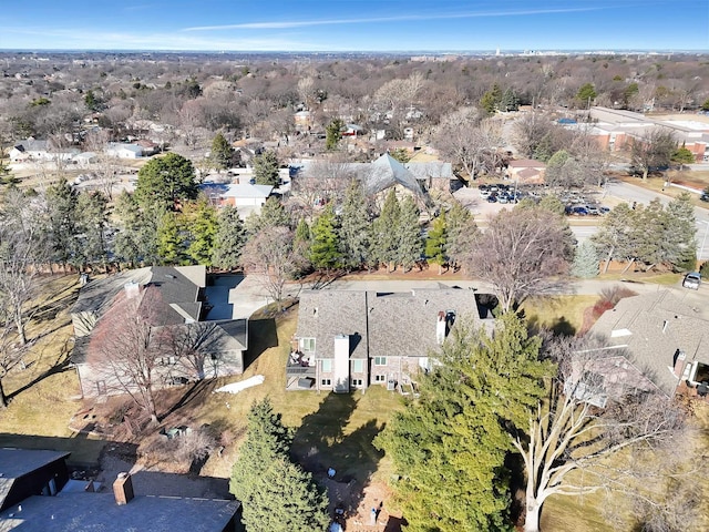 aerial view of property's location featuring nearby suburban area